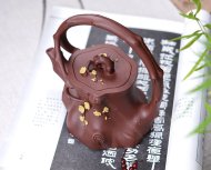 梅桩提梁