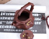 梅桩提梁